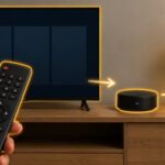 Smart TV remote, television, smart home hub, and lamp shown as a connected control system