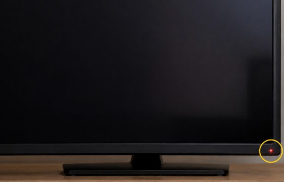 Smart TV with a lit standby indicator and a black screen